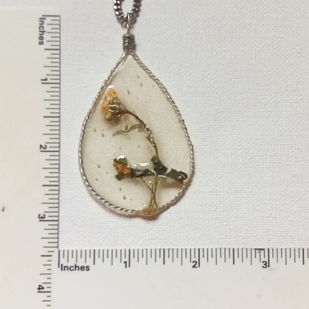 Large floral necklace, amulet